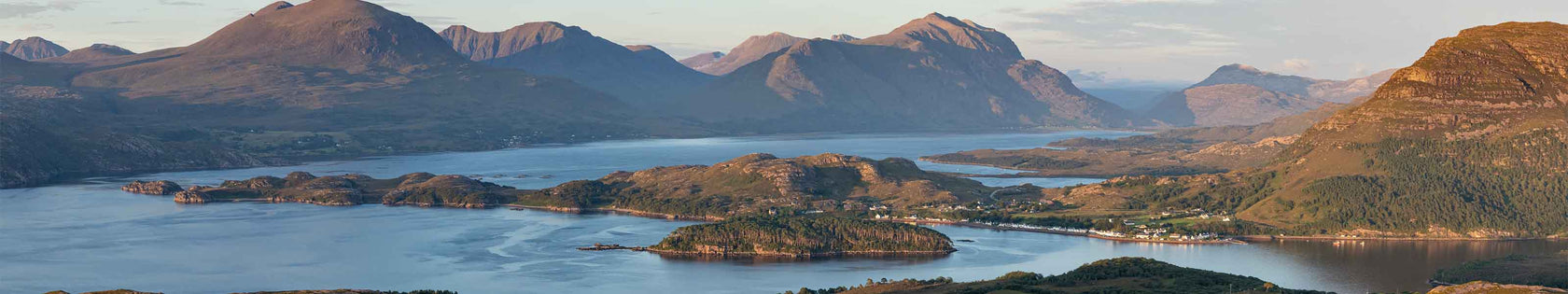 Sunset over Shieldaig and the Torridon Hills. NC500 route. Photographed by Jack Marris